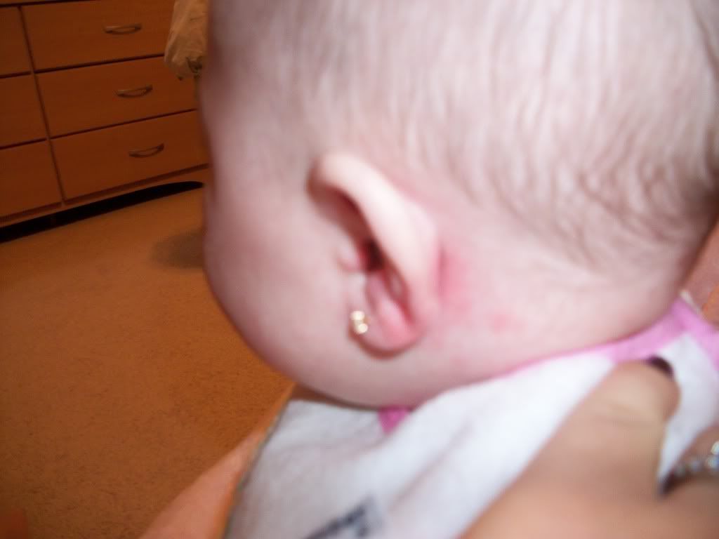 red bumps behind ear
